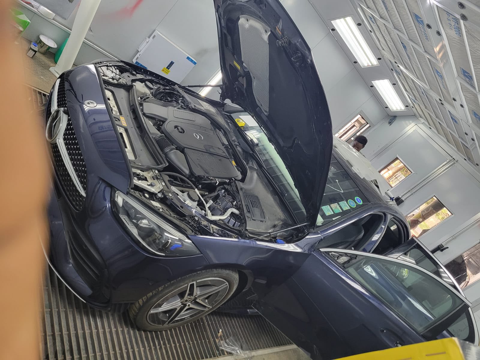 DOP Autopaint detailing technician perfecting a vehicle finish