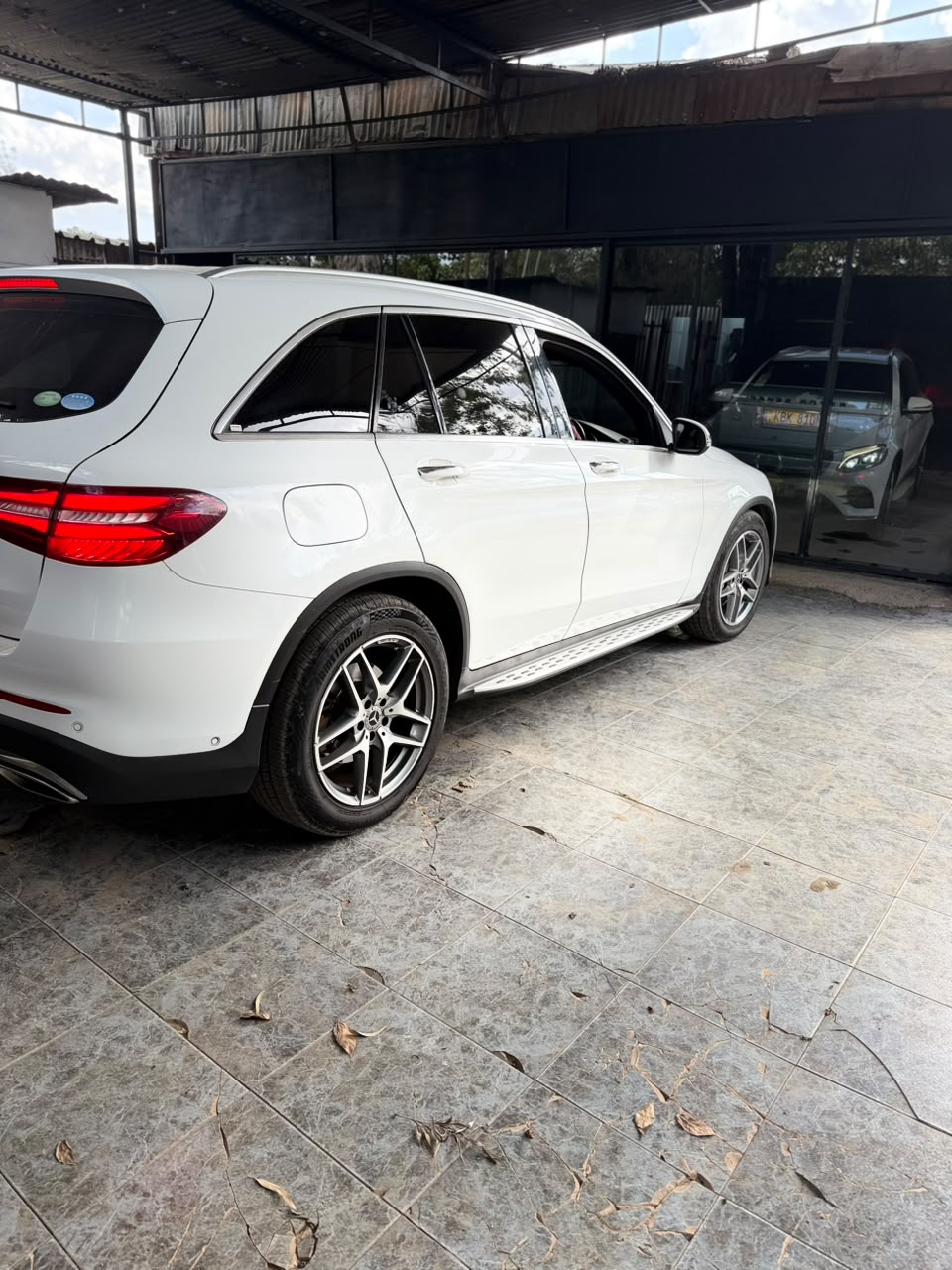 Customer booking a DOP Autopaint detailing appointment on a phone